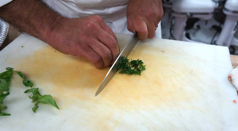 roll basil leaves then slice into a chiffonade