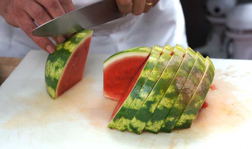slice a seedless watermelon into half inch thick wedges