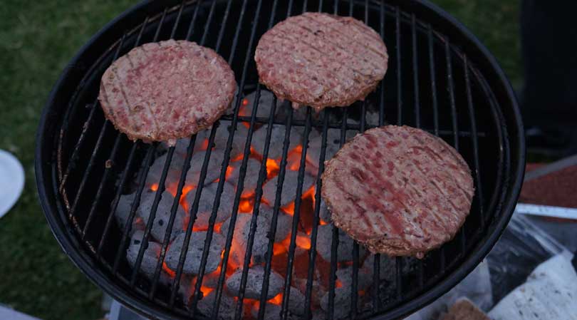 burger patties on the grill