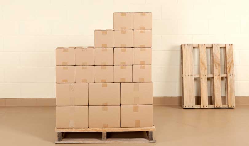 cardboard moving boxes on a pallet