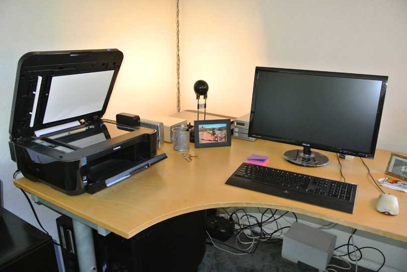 scanner and computer on desk paperless