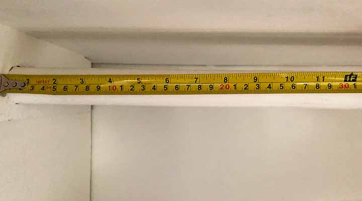 using measuring tape in closet