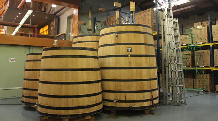 Whiskey barrels at Greenbar Distillery
