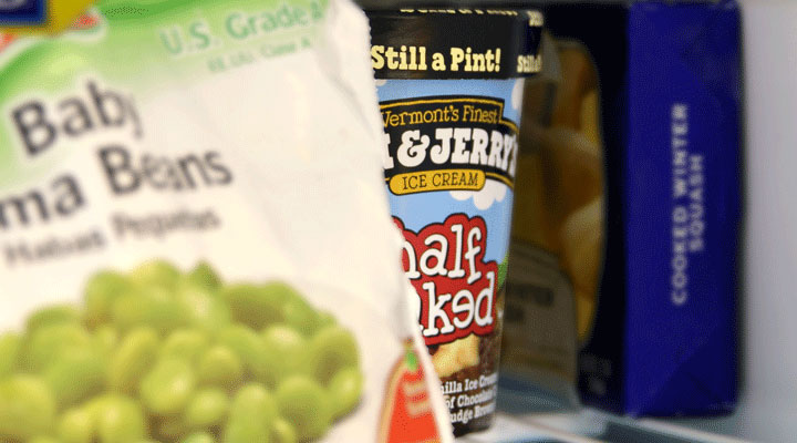 Ben and Jerry's Half Baked ice cream hides behind beans in freezer