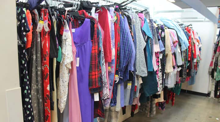rack of textiles and clothes at Goodwill Los Angeles