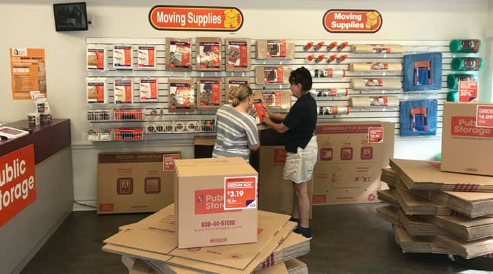 Public Storage employee helps with moving supplies