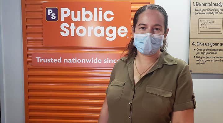 Public Storage manager stephanie wears a mask at storage facility